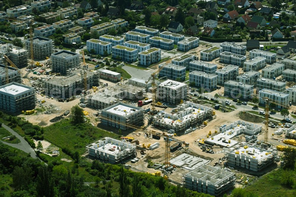 Aerial image Berlin - Construction site to build a new multi-family residential complex on Sternbluetenweg in the district Bohnsdorf in Berlin, Germany