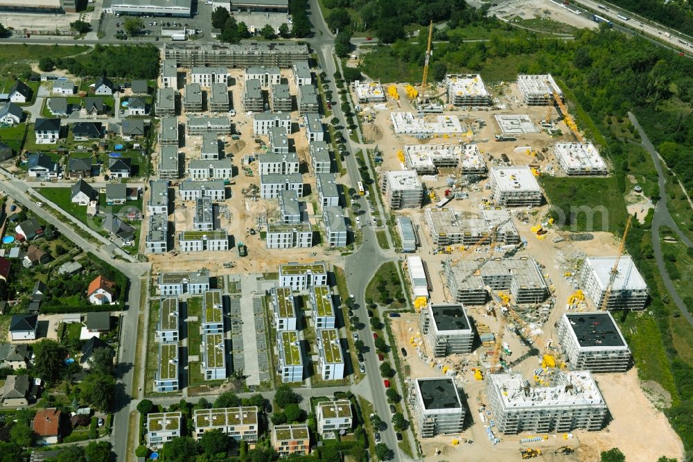 Aerial photograph Berlin - Construction site to build a new multi-family residential complex on Sternbluetenweg in the district Bohnsdorf in Berlin, Germany