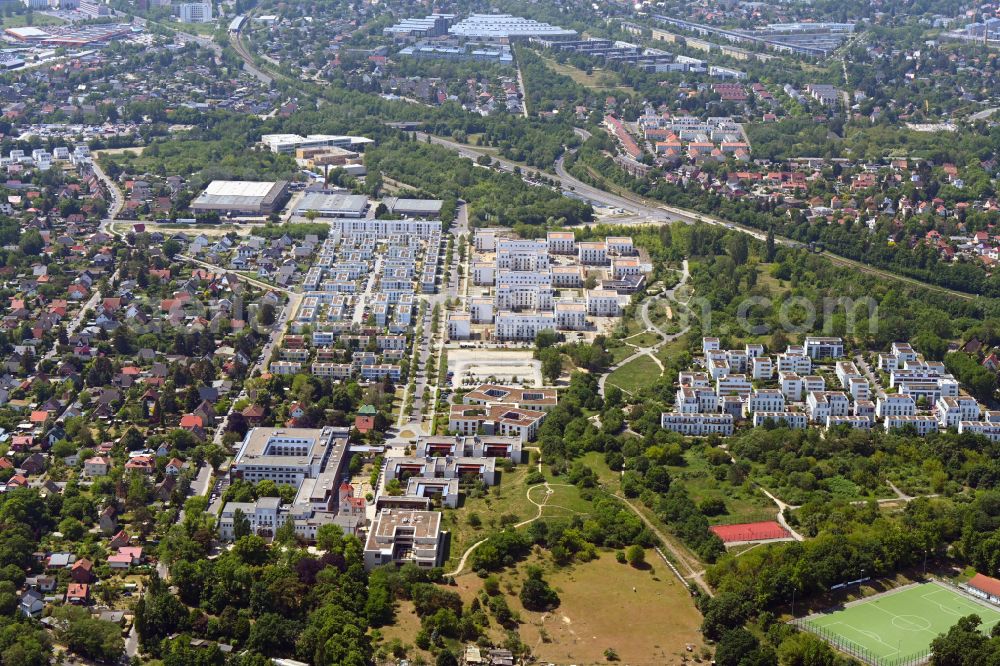 Berlin from above - Construction site to build a new multi-family residential complex on Sternbluetenweg in the district Bohnsdorf in Berlin, Germany