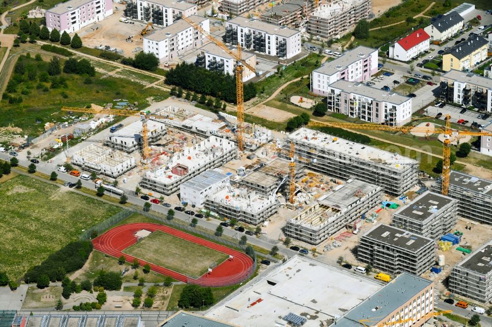 Aerial photograph Schönefeld - Construction site to build a new multi-family residential complex Theodor-Fontane-Hoefe of DIE Deutsche Immobilien Entwicklungs AG on Theodor-Fontane-Allee in Schoenefeld in the state Brandenburg, Germany