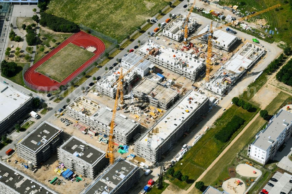Aerial image Schönefeld - Construction site to build a new multi-family residential complex Theodor-Fontane-Hoefe of DIE Deutsche Immobilien Entwicklungs AG on Theodor-Fontane-Allee in Schoenefeld in the state Brandenburg, Germany