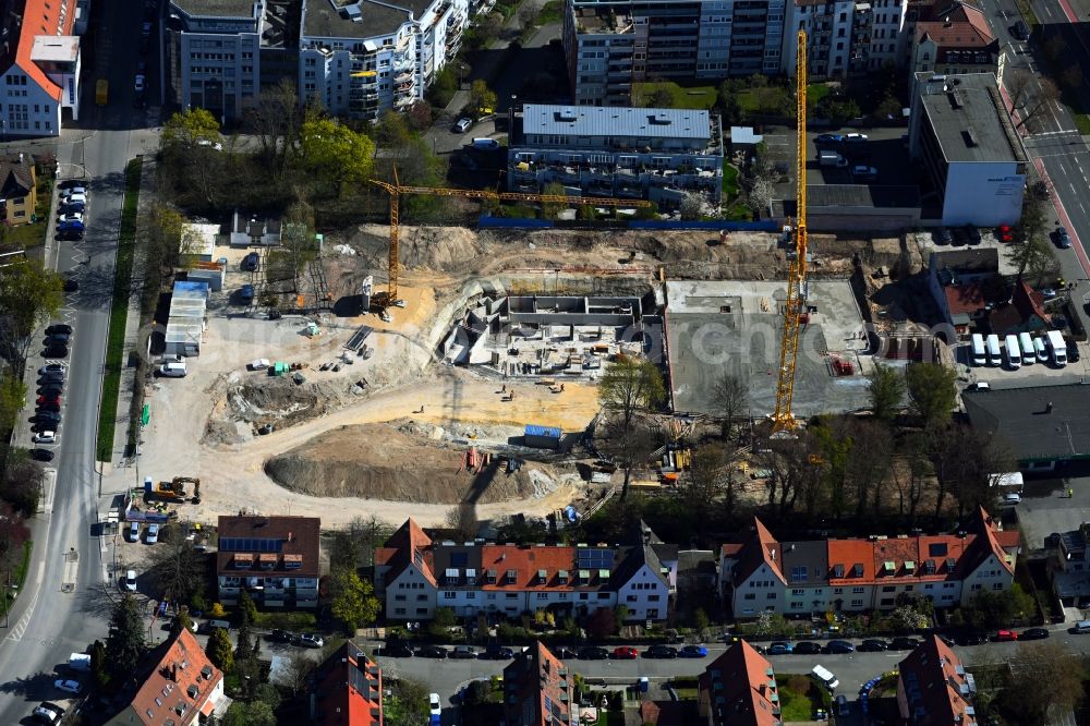 Nürnberg from the bird's eye view: Construction site to build a new multi-family residential complex Aeussere Bayreuther Strasse - Merianstrasse in the district Schleifweg in Nuremberg in the state Bavaria, Germany