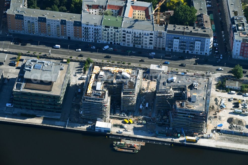 Berlin from above - Construction site to build a new multi-family residential complex WAVE WATERSIDE LIVING BERLIN on the former Osthafen port on Stralauer Allee in the district Friedrichshain in Berlin, Germany