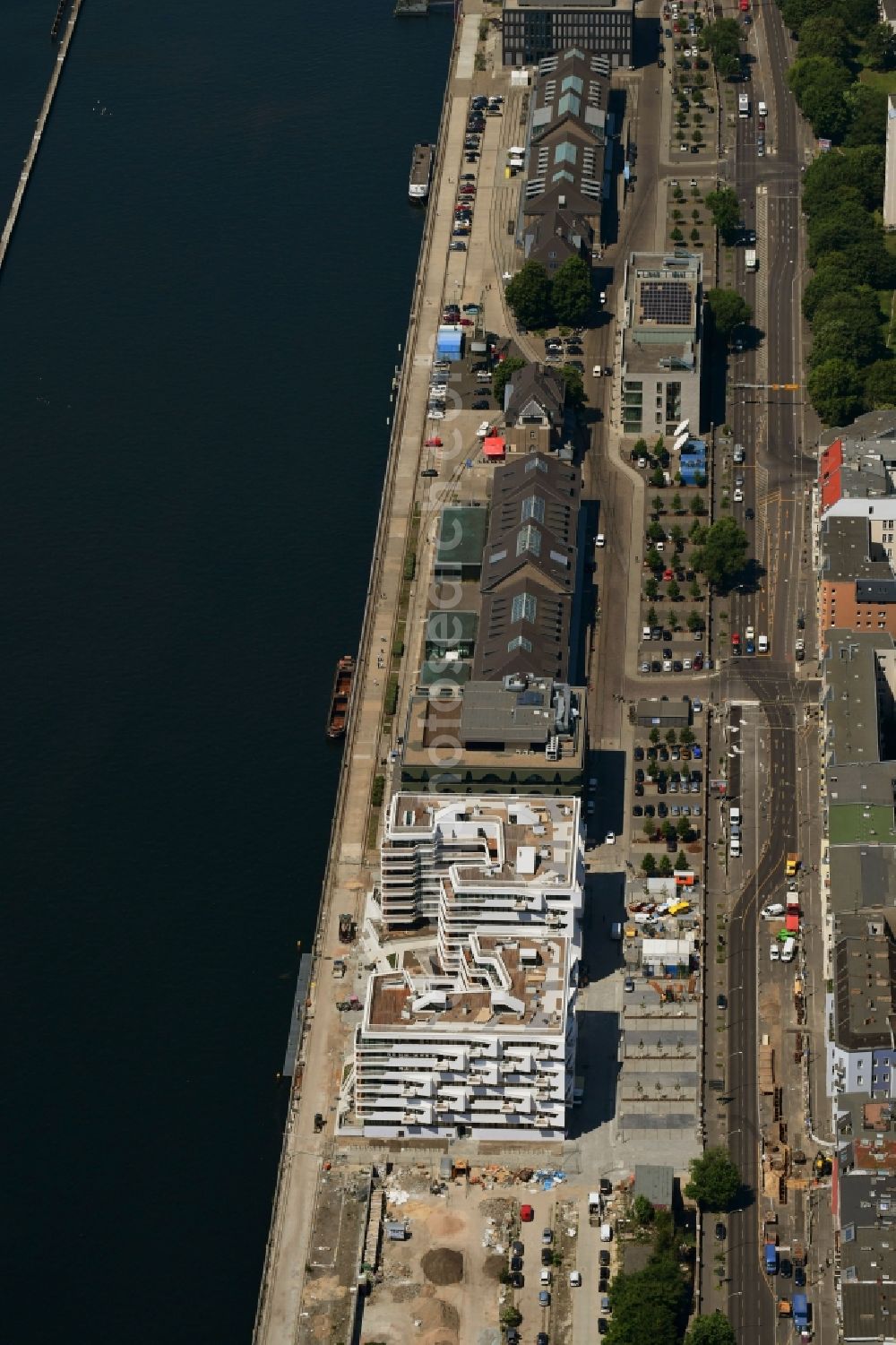 Berlin from above - Construction site to build a new multi-family residential complex WAVE WATERSIDE LIVING BERLIN on the former Osthafen port on Stralauer Allee in the district Friedrichshain in Berlin, Germany