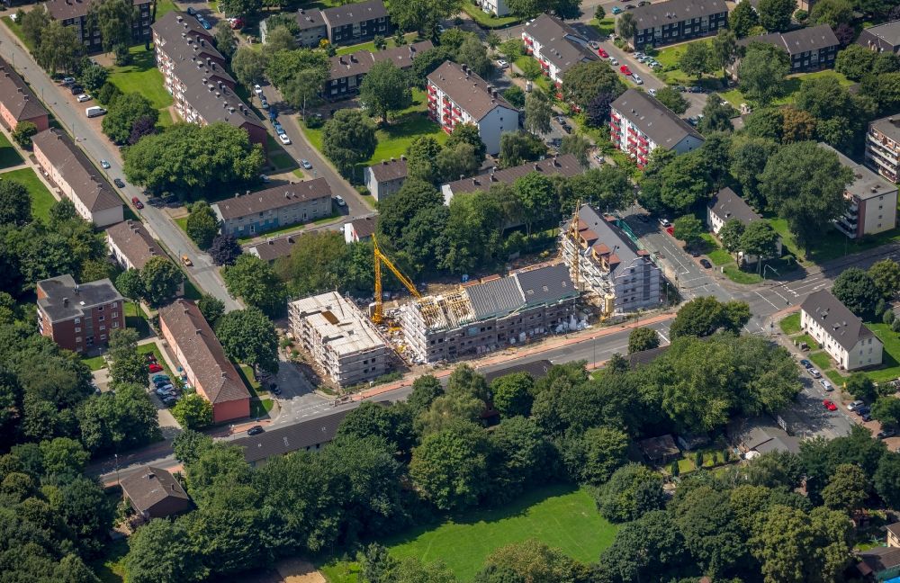 Duisburg from the bird's eye view: Construction site to build a new multi-family residential complex of BZ Wohnbau KG Am Driesenbusch in Duisburg in the state North Rhine-Westphalia, Germany