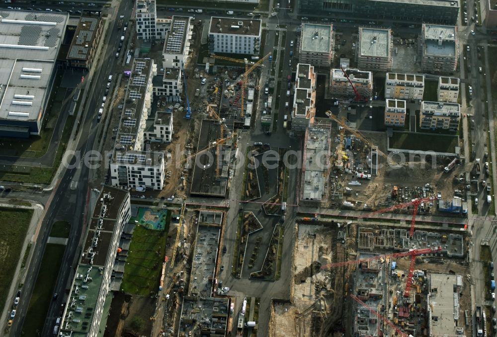 Aerial photograph Berlin - Construction site to build a new multi-family residential complex „ Wohnen am Campus “ an der Rudower Chaussee in Berlin in Germany