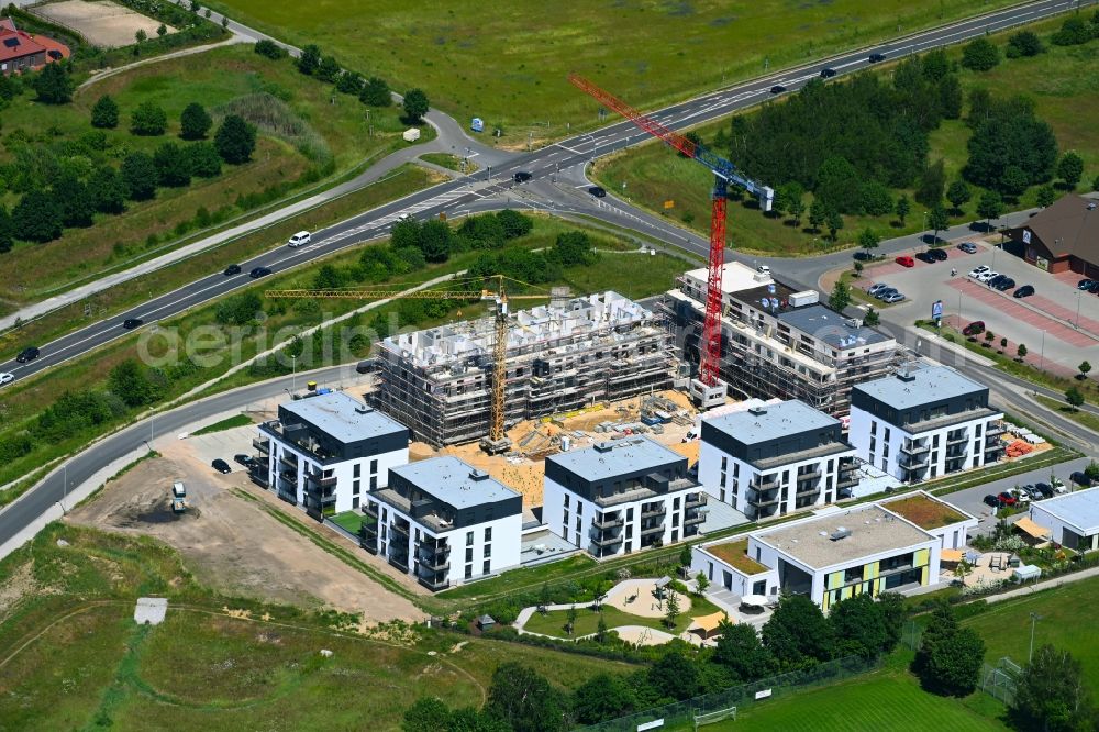 Aerial photograph Wolfsburg - Construction site to build a new multi-family residential complex to the Wildzaehnecke in the district Wendschott in Wolfsburg in the state Lower Saxony, Germany