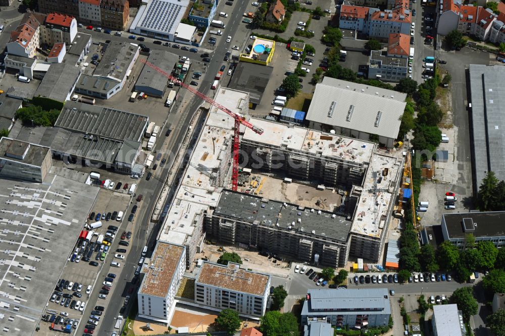 Nürnberg from the bird's eye view: Construction site to build a new multi-family residential complex between Zweigstrasse and Fuggerstrasse in Nuremberg in the state Bavaria, Germany