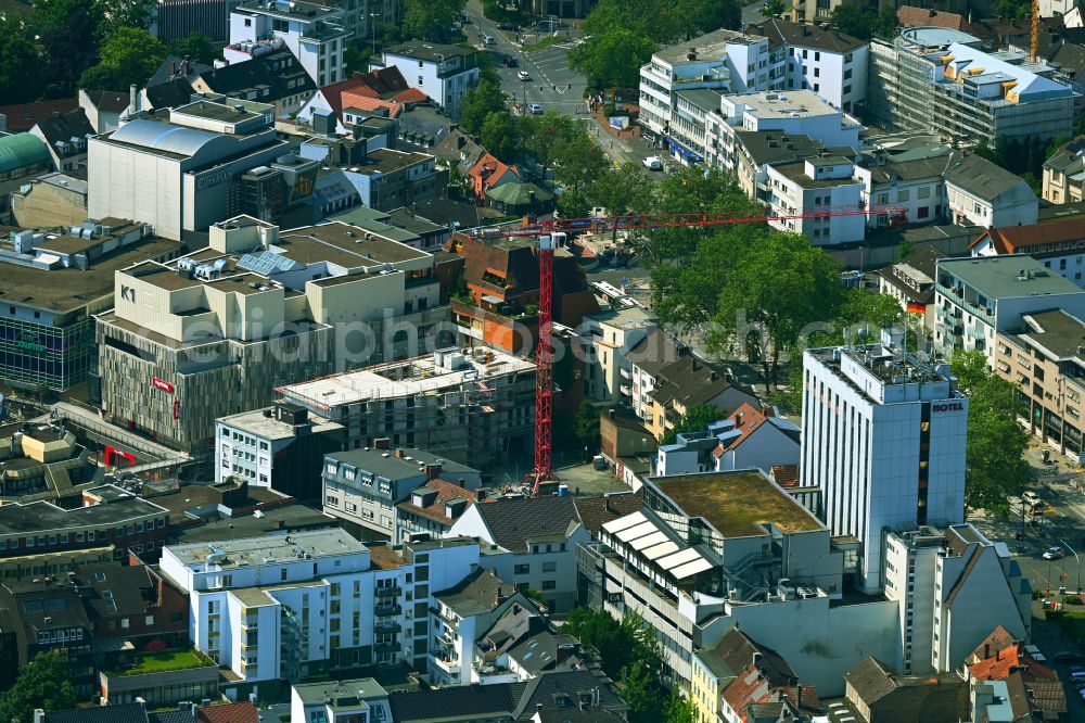 Paderborn from the bird's eye view: Construction site to build a new multi-family residential complex on Brueckengasse - Koenigstrasse in Paderborn in the state North Rhine-Westphalia, Germany