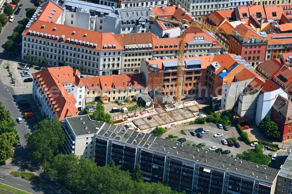 Dresden from the bird's eye view: Construction site to build a new multi-family residential complex on street Heinrichstrasse in the district Innere Neustadt in Dresden in the state Saxony, Germany
