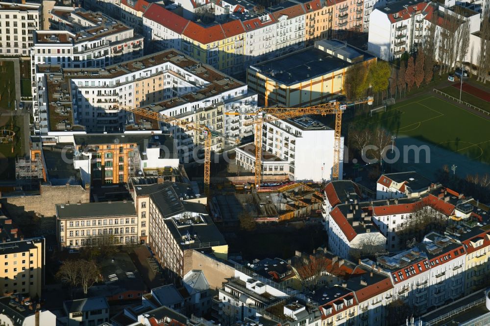 Berlin from above - Construction site to build a new multi-family residential complex the Schreibfederhoefe on Weserstrasse in the district Friedrichshain in Berlin, Germany