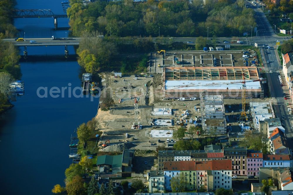 Aerial image Brandenburg an der Havel - Construction site for the new building of apartment houses and a REWE-Center supermarket on Neuendorfer Strasse in Brandenburg an der Havel in the state Brandenburg, Germany