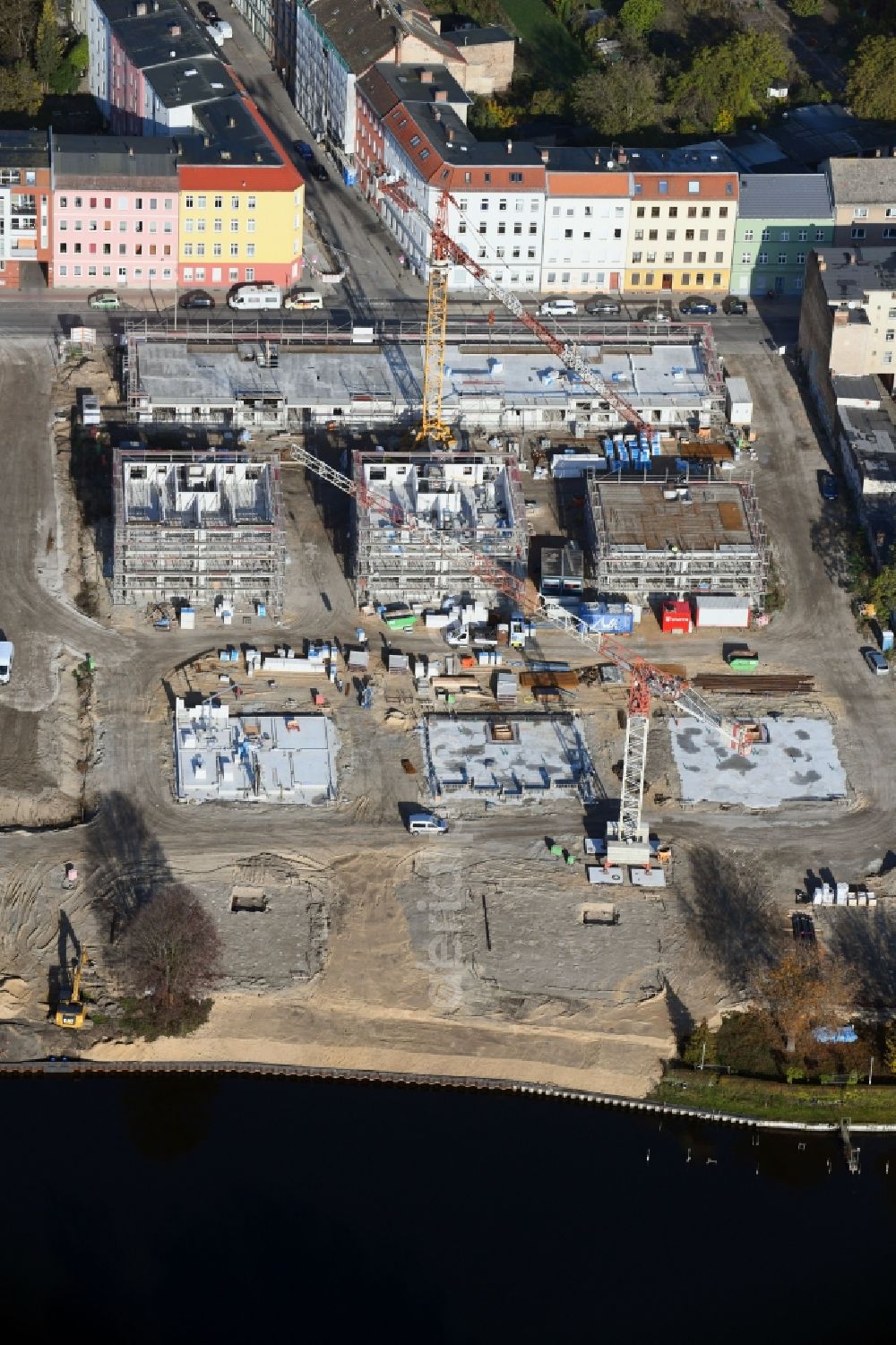 Aerial photograph Brandenburg an der Havel - Construction site for the new building of apartment houses and a REWE-Center supermarket on Neuendorfer Strasse in Brandenburg an der Havel in the state Brandenburg, Germany