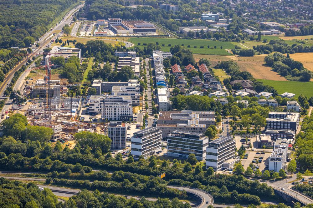 Aerial photograph Dortmund - Construction site for a new building next to the adesso SE building complex on Stockholmer Allee in the district Schueren-Neu in Dortmund in the state North Rhine-Westphalia, Germany