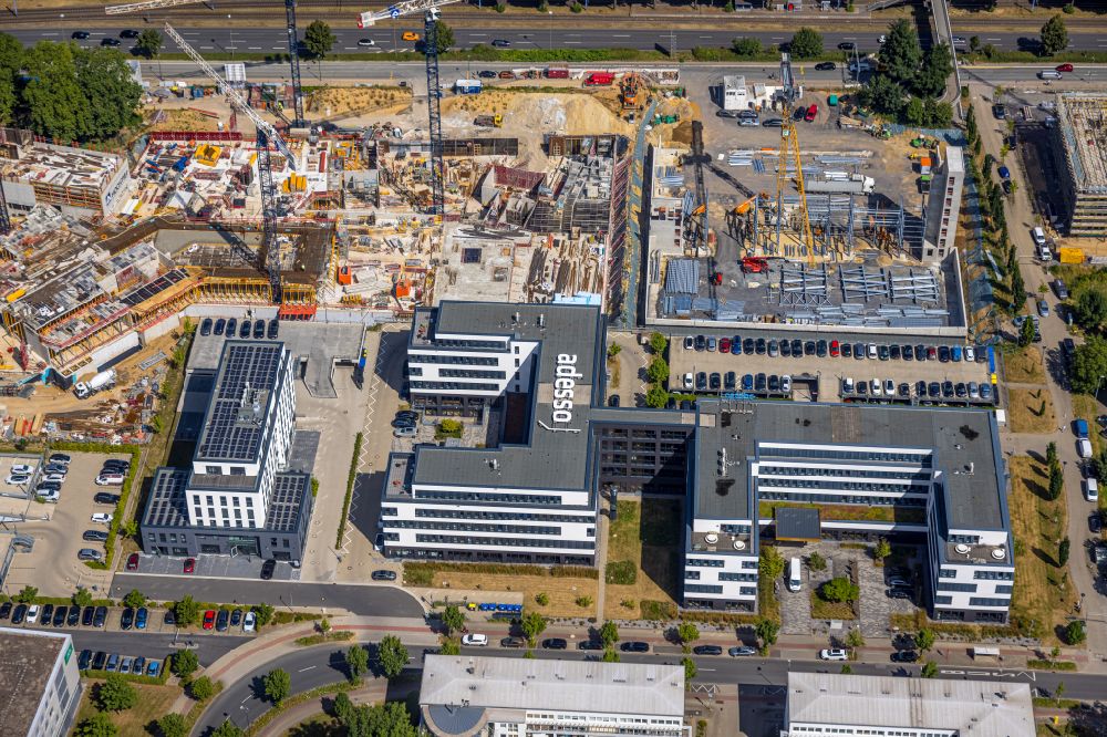 Dortmund from above - Construction site for a new building next to the adesso SE building complex on Stockholmer Allee in the district Schueren-Neu in Dortmund in the state North Rhine-Westphalia, Germany