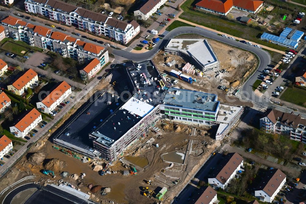 Hönow from above - Construction site for the new building city destrict center between of Schulstrasse and of Marderstrasse in Hoenow in the state Brandenburg, Germany