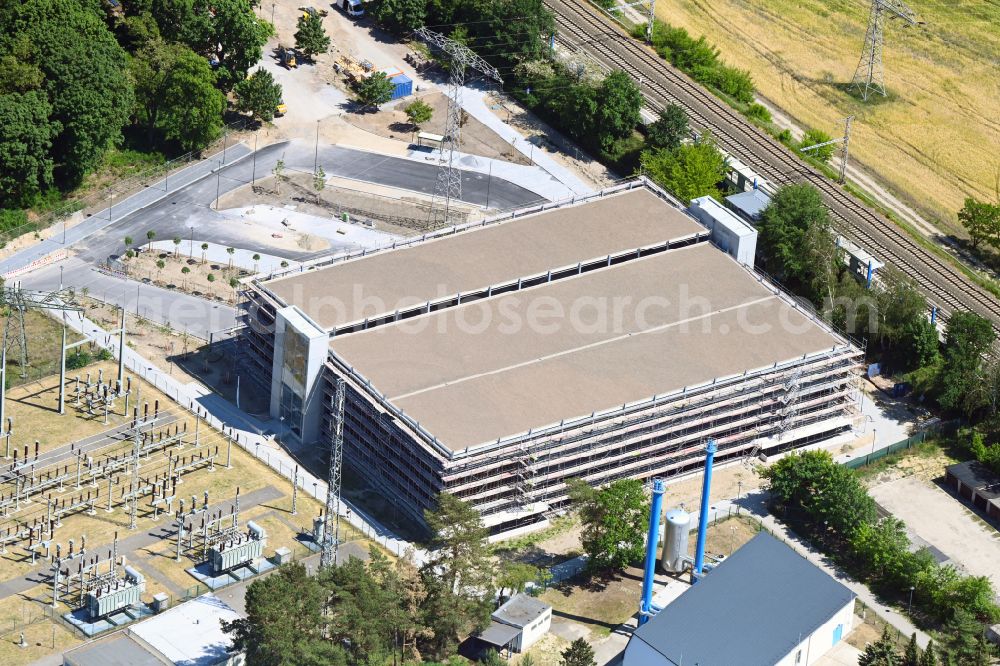 Aerial photograph Bernau - Construction site for the new parking garage bevore train station on Lenastrasse on street Angarastrasse in the district Friedenstal in Bernau in the state Brandenburg, Germany