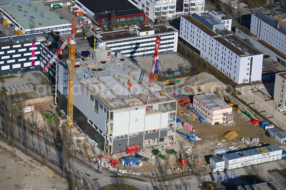 Aerial photograph Aschheim - Construction site for the new parking garage Karl-Hammerschmidt-Strasse corner Dywidagstrass in the district Dornach in Aschheim in the state Bavaria, Germany