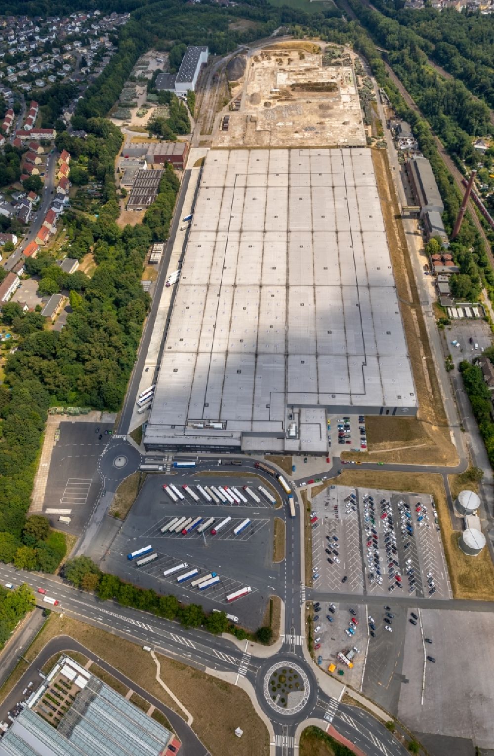 Bochum from the bird's eye view: Construction site for the new building Production and logistics halls at the former OPEL plant II and III in Langendreer in Bochum in the state North Rhine-Westphalia