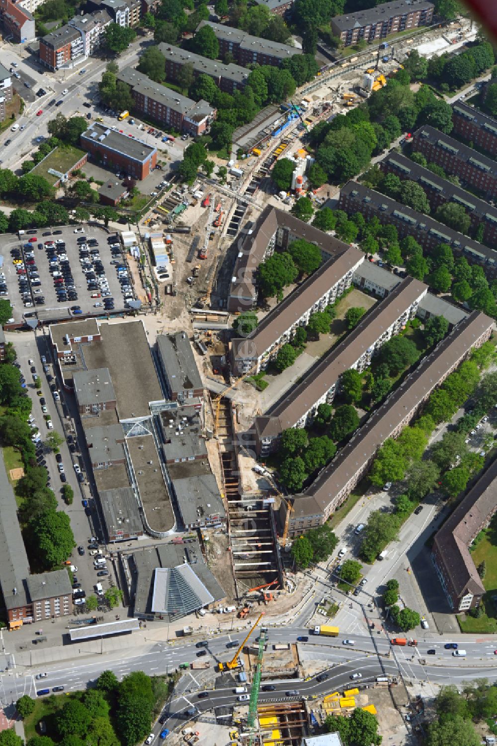 Aerial photograph Hamburg - Construction site for new train- tunnel construction of U-Bahn-Verlaengerung on U-Bahnhof Honer Rennbahn in Hamburg, Germany