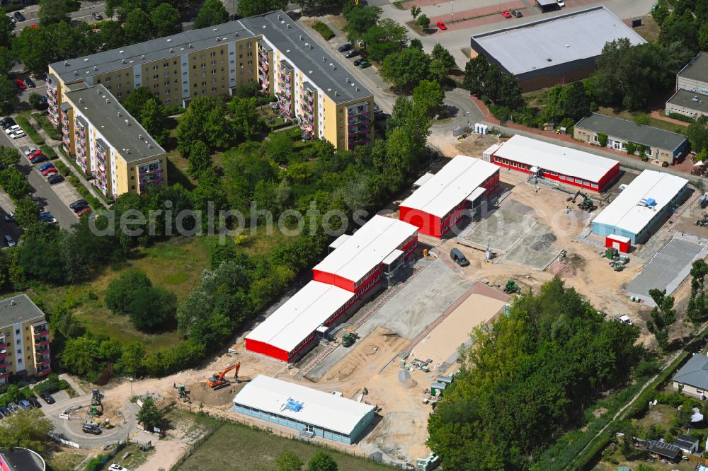 Hellersdorf from above - Construction site for the new construction of the school building - school container as a compartment school on Hildestrasse - Louis-Lewin-Strasse in Hellersdorf in the state Brandenburg, Germany