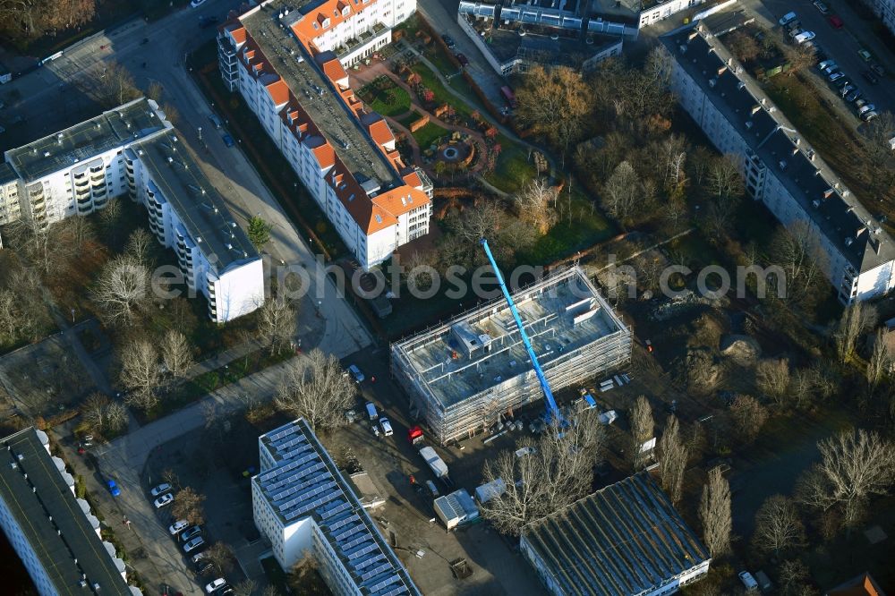Berlin from above - New construction site of the school building in the form of an extension construction for the Grundschule auf dem lichten Berg on Atzpodienstrasse in the district Lichtenberg in Berlin, Germany