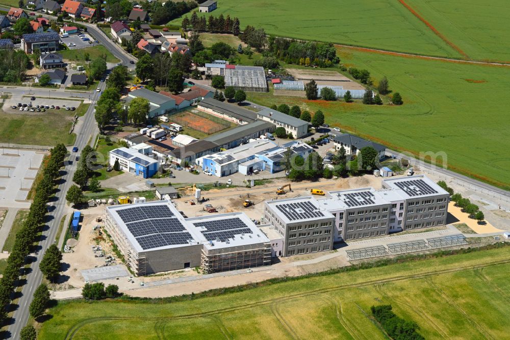 Lindenberg from above - New construction site of the school building between Ahrensfelof Chaussee in Lindenberg in the state Brandenburg, Germany