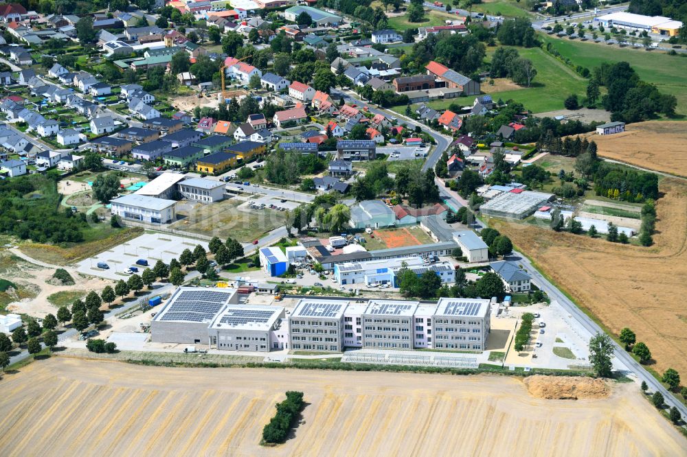 Lindenberg from the bird's eye view: New construction site of the school building between Ahrensfelof Chaussee in Lindenberg in the state Brandenburg, Germany