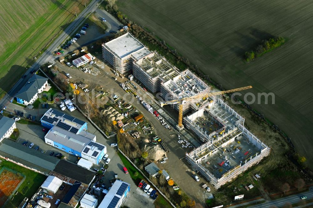 Ahrensfelde from above - New construction site of the school building between Ahrensfelof Chaussee in the district Lindenberg in Ahrensfelde in the state Brandenburg, Germany