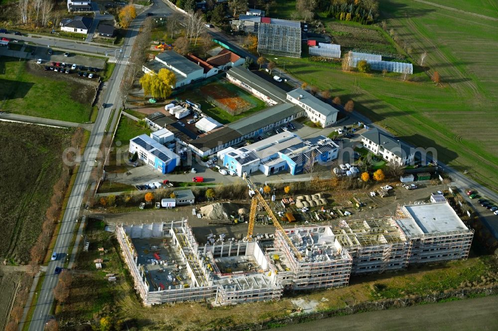 Ahrensfelde from the bird's eye view: New construction site of the school building between Ahrensfelof Chaussee in the district Lindenberg in Ahrensfelde in the state Brandenburg, Germany