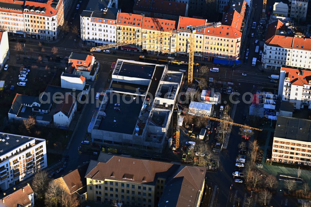 Leipzig from above - Construction site for the new building of the indoor swimming pool on place Otto-Runki-Platz on street Neustaedter Strasse in the district Neustadt-Neuschoenefeld in Leipzig in the state Saxony, Germany