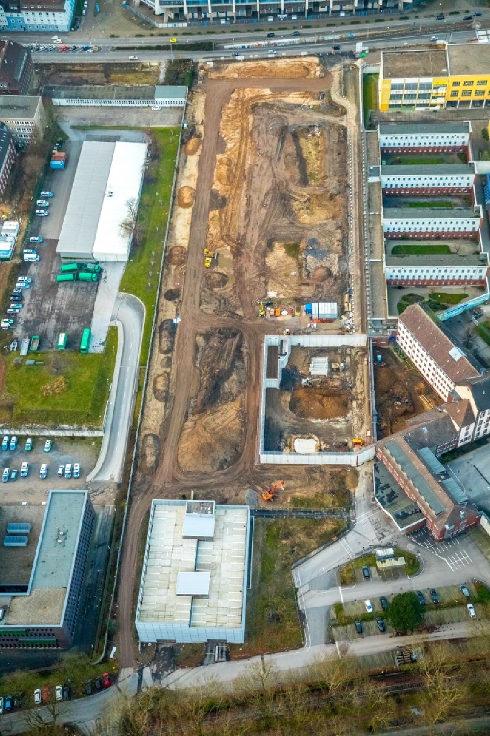Bochum from the bird's eye view: New construction Social Therapeutic Institute on the site of prison premises and security fencing of the prison on Kruemmede in Bochum in the state North Rhine-Westphalia, Germany