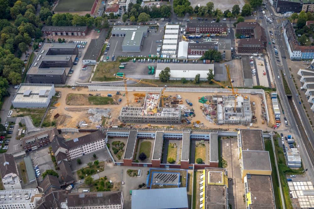 Aerial photograph Bochum - New construction Social Therapeutic Institute on the site of prison premises and security fencing of the prison on Kruemmede in Bochum in the state North Rhine-Westphalia, Germany