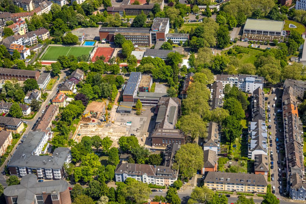 Essen from above - Construction site for the new sports hall Helmholtz-Gymnasium and Maria-Waechtler-Gymnasium in the district Ruettenscheid in Essen at Ruhrgebiet in the state North Rhine-Westphalia, Germany