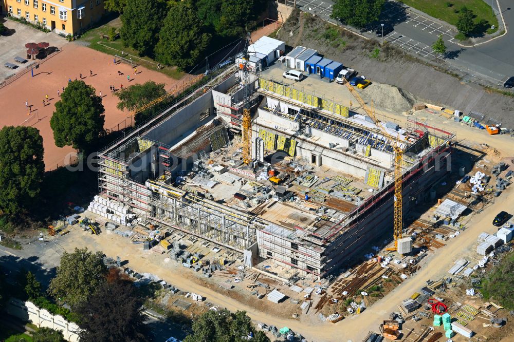 Plauen from above - Construction site for the new sports hall Multifunktionshalle on Plauener Lessinggymnasium on street Chamissostrasse in the district Chrieschwitz in Plauen Vogtland in the state Saxony, Germany