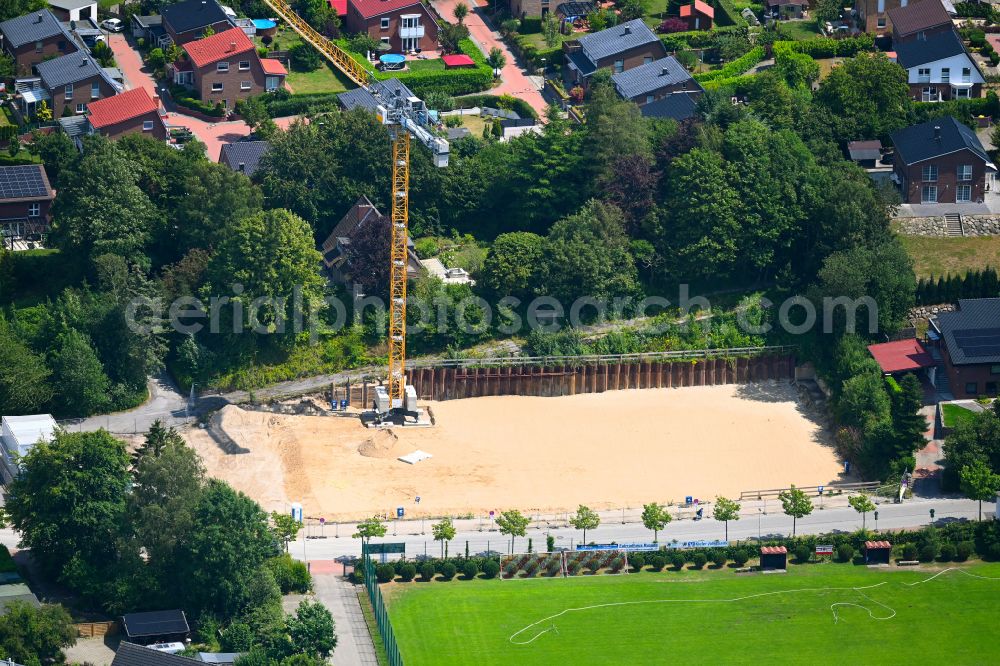 Kiel from the bird's eye view: Construction site for the new sports hall on street Liselotte-Hermann-Strasse in the district Wellsee in Kiel in the state Schleswig-Holstein, Germany