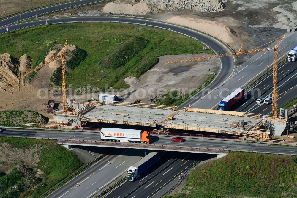 Aerial image Oberkrämer - Construction site for the new construction of the road bridge construction at the motorway exit and access Oberkraemer in the state of Brandenburg, Germany