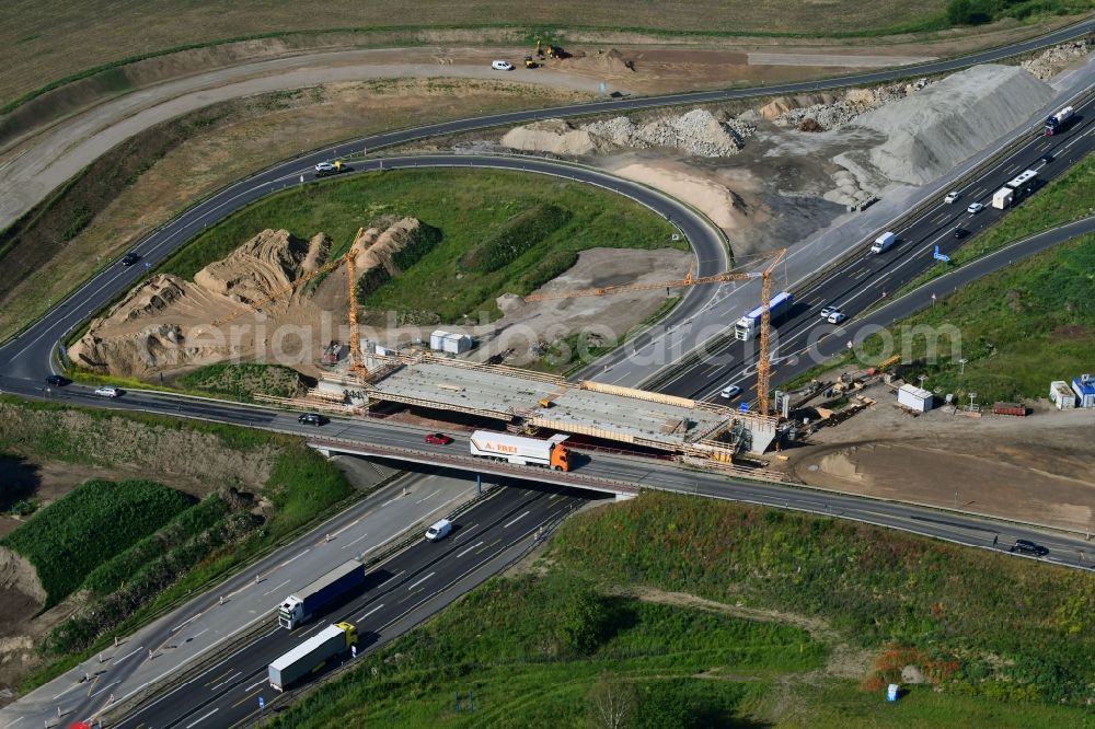 Aerial photograph Oberkrämer - Construction site for the new construction of the road bridge construction at the motorway exit and access Oberkraemer in the state of Brandenburg, Germany