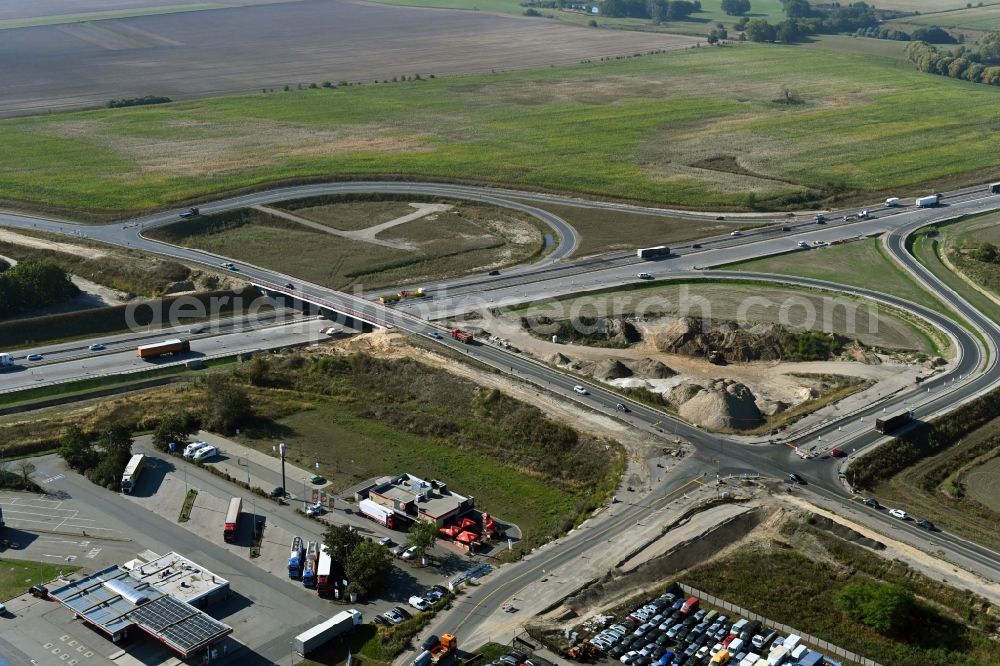 Oberkrämer from above - Construction site for the new construction of the road bridge construction at the motorway exit and access Oberkraemer in the state of Brandenburg, Germany