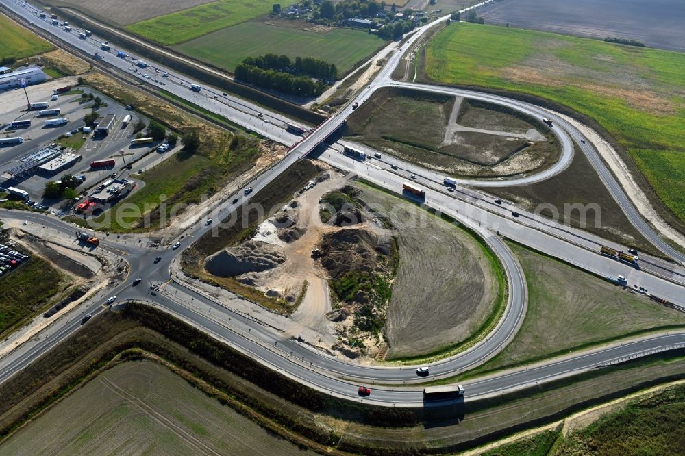 Oberkrämer from the bird's eye view: Construction site for the new construction of the road bridge construction at the motorway exit and access Oberkraemer in the state of Brandenburg, Germany