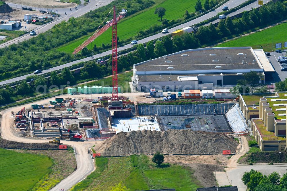 Plankstadt from the bird's eye view: Construction site for the new building of the indoor arena and culture center Kultur- and Sportquartier Westend on street Jahnstrasse in the district Rheinau in Plankstadt in the state Baden-Wuerttemberg, Germany