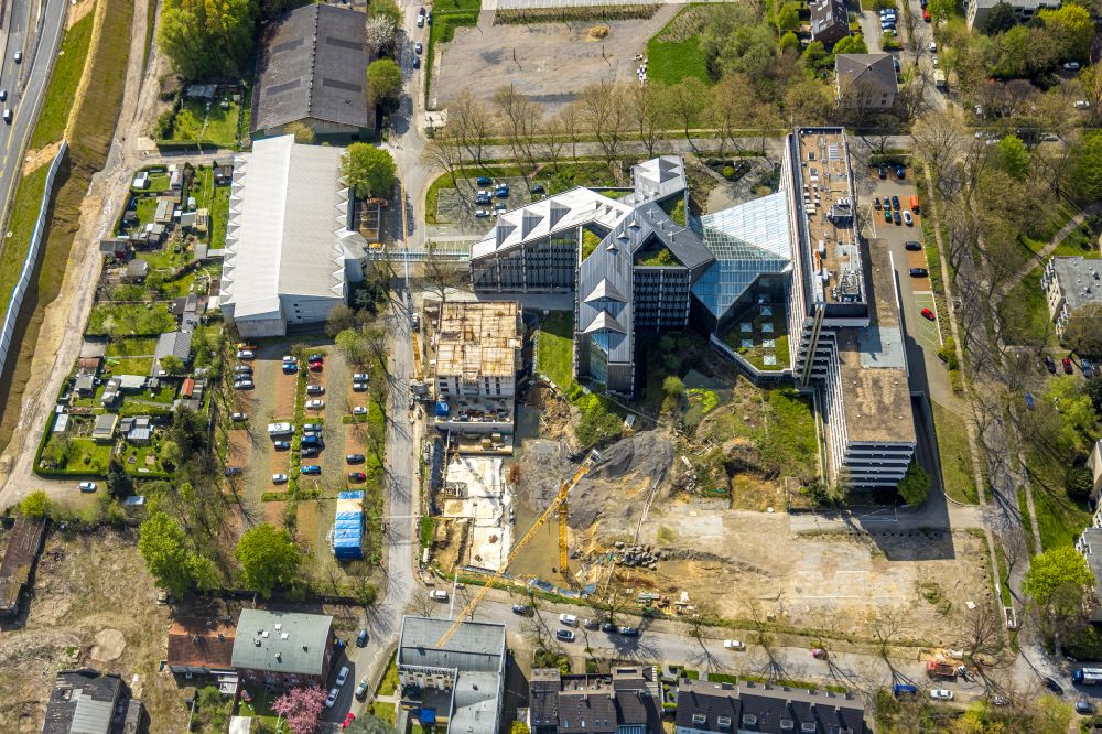Bochum from the bird's eye view: Construction site for the new construction of four apartment buildings on Paulstrasse in the district of Altenbochum in Bochum in the Ruhr area in the state of North Rhine-Westphalia, Germany