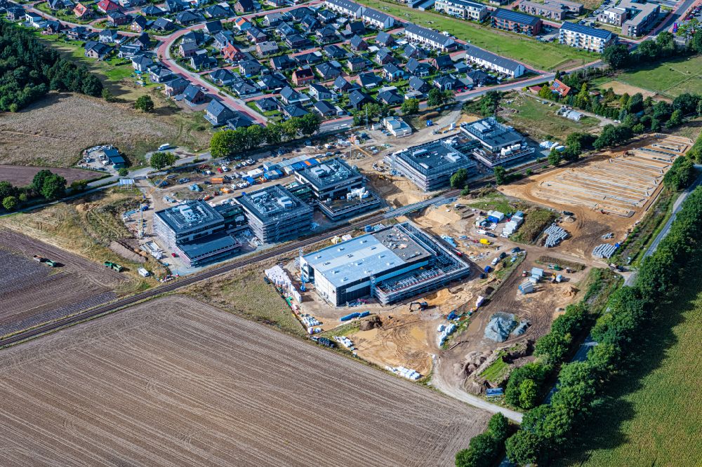 Aerial photograph Stade - Construction site for the new building complex of the education and training center in the district Riensfoerde on street Stadtweg in the district Riensfoerde in Stade in the state Lower Saxony, Germany