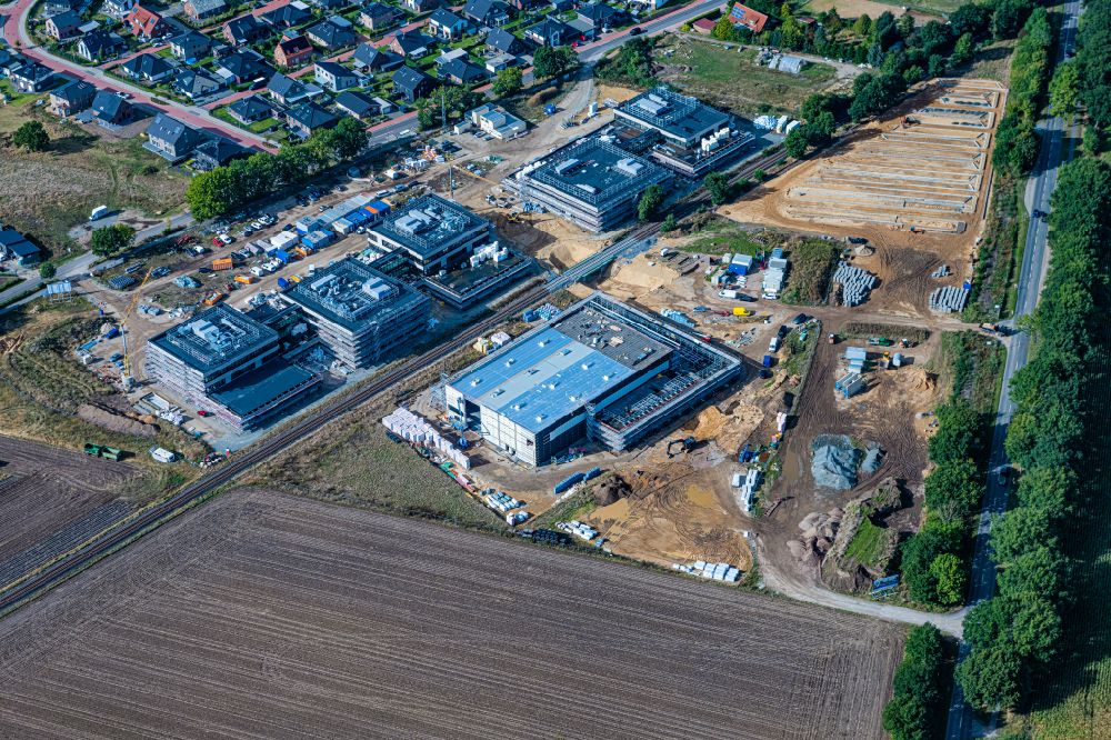 Stade from above - Construction site for the new building complex of the education and training center in the district Riensfoerde on street Stadtweg in the district Riensfoerde in Stade in the state Lower Saxony, Germany