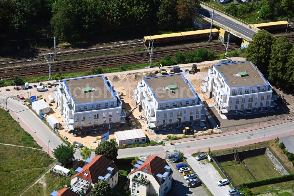 Bergfelde from the bird's eye view: Construction site for the new residential and commercial building on Brueckenstrasse in Bergfelde in the state Brandenburg, Germany