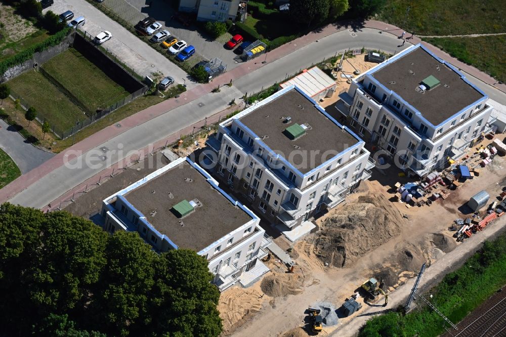 Aerial image Bergfelde - Construction site for the new residential and commercial building on Brueckenstrasse in Bergfelde in the state Brandenburg, Germany