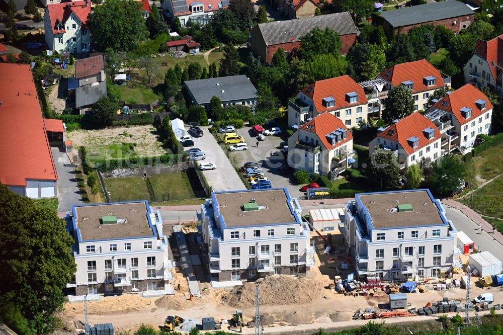 Bergfelde from above - Construction site for the new residential and commercial building on Brueckenstrasse in Bergfelde in the state Brandenburg, Germany