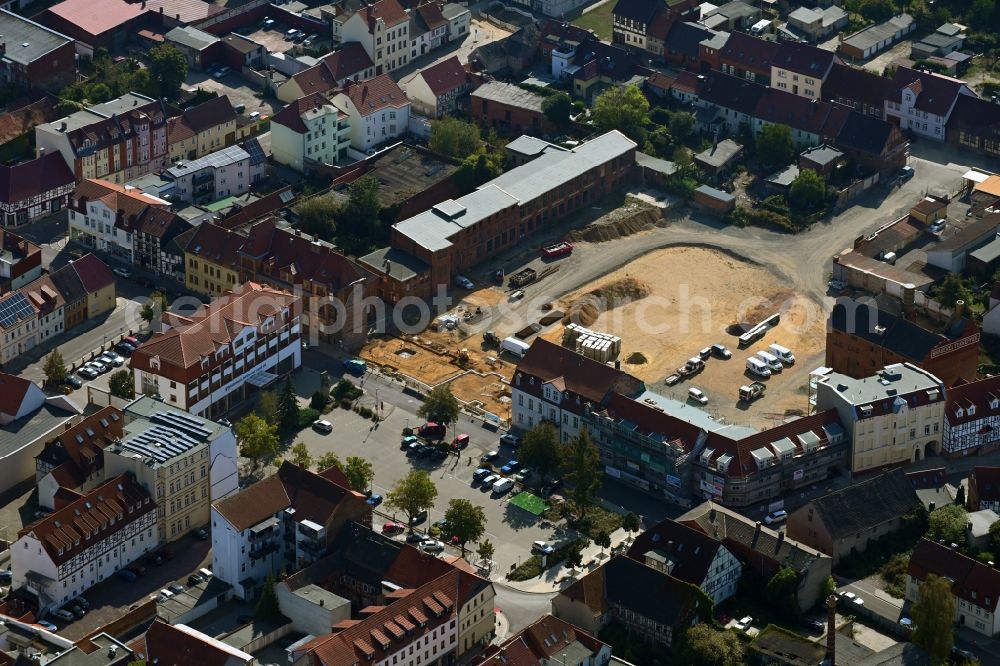 Aerial photograph Burg - Construction site for the new residential and commercial building on Bruederstrasse in Burg in the state Saxony-Anhalt, Germany