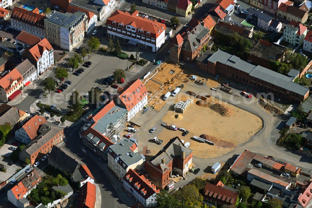 Aerial photograph Burg - Construction site for the new residential and commercial building on Bruederstrasse in Burg in the state Saxony-Anhalt, Germany
