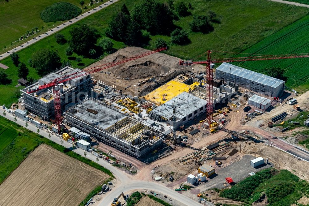 Aerial image Rust - Construction site for the new residential and commercial building Ellenweg in Rust in the state Baden-Wurttemberg, Germany